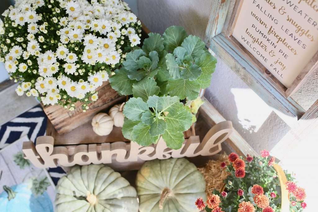pumpkins and flowers on front porch fall decorated front porch