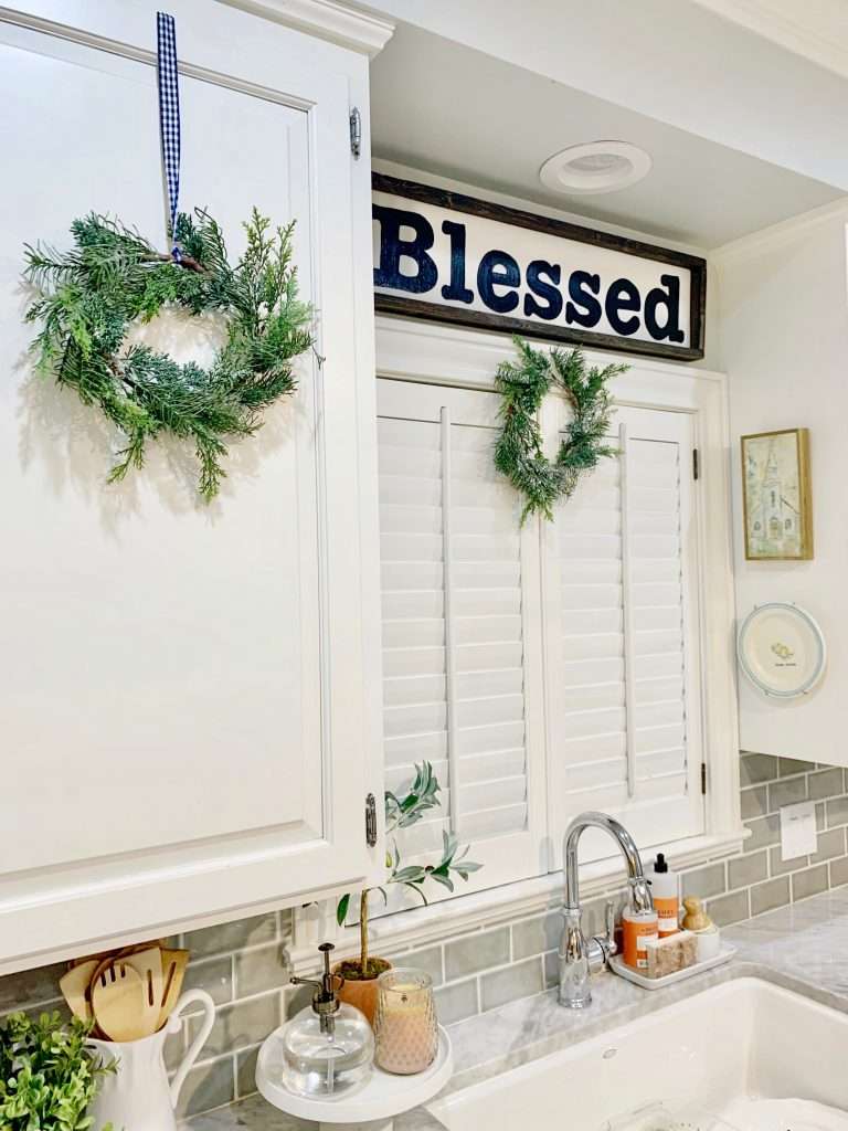 wreaths on kitchen cabinets