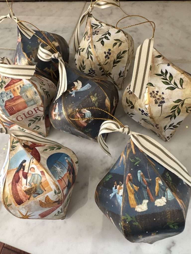decoupage paper mache christmas ornaments  with scrapbook paper for a cozy cottage christmas 