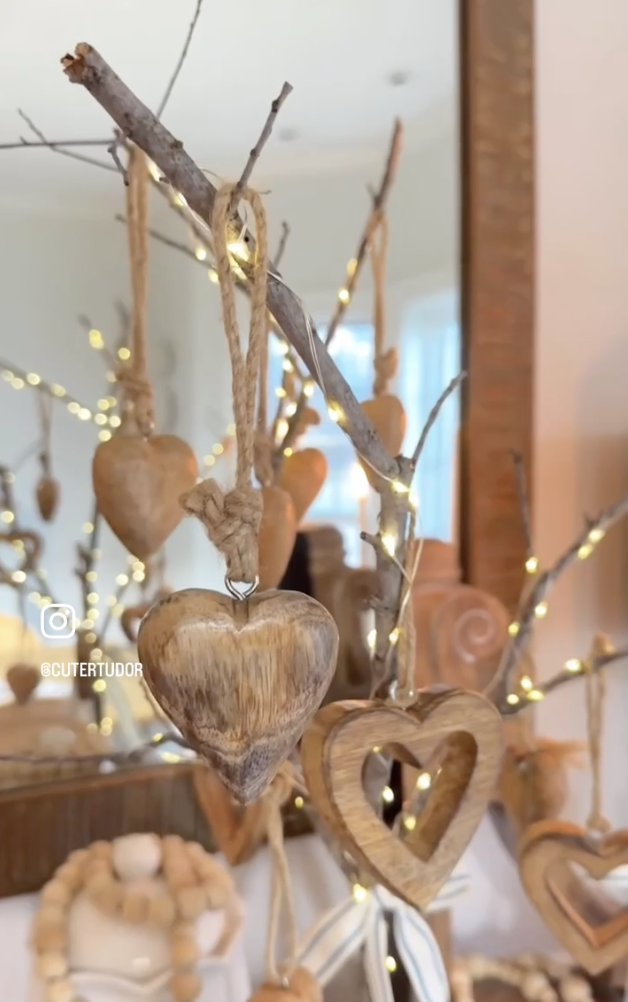 neutral Valentine's Day tree decoration made from natural elements and string lights